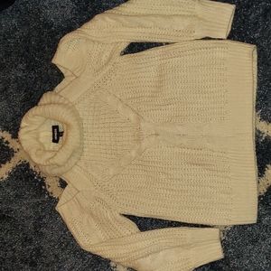 Cream turtleneck, cold shoulder sweater